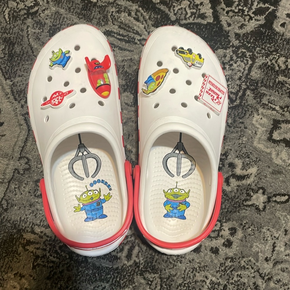 Pizza Planet crocs tried on indoors only